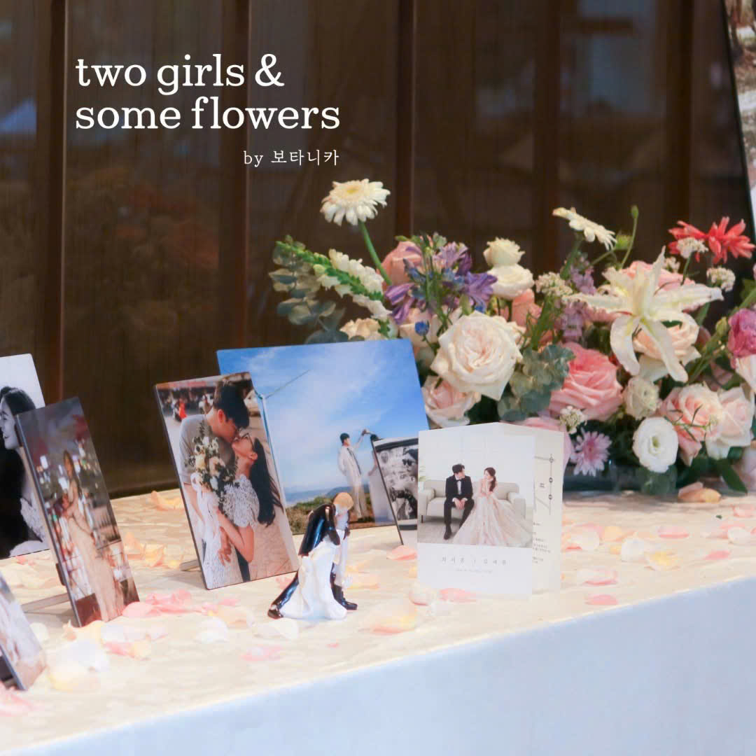 Two girls and some flowers
